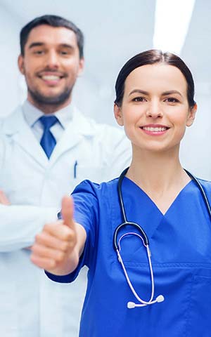 Nurse giving a big thumbs up Nurse giving a big thumbs up